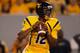 MORGANTOWN, WV - SEPTEMBER 24: Geno Smith #12 of the West Virginia Mountaineers drops back to pass against the Louisiana State University Tigers during the game on September 24, 2011 at Mountaineer Field in Morgantown, West Virginia. (Photo by Jared Wickerham/Getty Images)