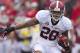 FAYETTEVILLE, AR - SEPTEMBER 15: Dee Milliner #28 of the Alabama Crimson Tide runs the ball against the Arkansas Razorbacks at Razorback Stadium on September 15, 2012 in Fayetteville, Arkansas. The Crimson Tide defeated the Razorbacks 52-0. (Photo by Wesley Hitt/Getty Images)