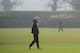 Arsene Wenger cuts a lonely figure as speculation over his future is heightened by last night's defeat to Bayern Munich