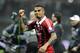 MILAN, ITALY - FEBRUARY 20: Kevin Prince Boateng of AC Milan celebrates victory at the end of the UEFA Champions League Round of 16 first leg match between AC Milan and Barcelona at San Siro Stadium on February 20, 2013 in Milan, Italy. (Photo by Claudio Villa/Getty Images)
