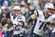 SEATTLE, WA - OCTOBER 14: Tom Brady #12 of the New England Patriots looks to pass as Sebastian Vollmer #76 blocks during game against teh Seattle Seahawks at CenturyLink Field on October 14, 2012 in Seattle, Washington. The Seahawks beat the Patriots 24-23. (Photo by Stephen Brashear/Getty Images)