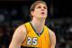 DENVER, CO - DECEMBER 18: Timofey Mozgov #25 of the Denver Nuggets takes a free throw against the San Antonio Spurs at the Pepsi Center on December 18, 2012 in Denver, Colorado. The Nuggets defeated the Spurs 112-106. NOTE TO USER: User expressly acknowledges and agrees that, by downloading and or using this photograph, User is consenting to the terms and conditions of the Getty Images License Agreement. (Photo by Doug Pensinger/Getty Images)