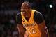 LOS ANGELES, CA - FEBRUARY 20: Dwight Howard #12 of the Los Angeles Lakers reacts after being called for a travel against the Boston Celtics at Staples Center on February 20, 2013 in Los Angeles, California. The Lakers won 113-99. NOTE TO USER: User expressly acknowledges and agrees that, by downloading and or using this photograph, User is consenting to the terms and conditions of the Getty Images License Agreement. (Photo by Stephen Dunn/Getty Images)