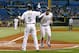 ST. PETERSBURG , FL- OCTOBER 01: Outfielder Sam Fuld #5 of the Tampa Bay Rays congratulates Evan Longoria #3 after he scored on a sacrifice against the Baltimore Orioles during the game at Tropicana Field on October 1, 2012 in St. Petersburg, Florida. (Photo by J. Meric/Getty Images)