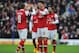 BRIGHTON, ENGLAND - JANUARY 26: Olivier Giroud of Arsenal (12) celebrates with team mate Lukas Podolski (9) as he scores their first goal during the FA Cup with Budweiser Fourth Round match between Brighton & Hove Albion and Arsenal at Amex Stadium on January 26, 2013 in Brighton, England. (Photo by Steve Bardens/Getty Images)