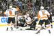 February 20, 2013; Pittsburgh, PA, USA; Philadelphia Flyers defenseman Nicklas Grossmann (8) celebrates scoring a goal out of a scrum in front of the Pittsburgh Penguins net during the first period at the CONSOL Energy Center. Mandatory Credit: Charles LeClaire-USA TODAY Sports