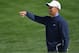 MARANA, AZ - FEBRUARY 19: Tiger Woods of USA gestures during practice prior to the start of the World Golf Championships-Accenture Match Play Championship at the Ritz-Carlton Golf Club on February 19, 2013 in Marana, Arizona. (Photo by Stuart Franklin/Getty Images)
