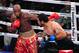 September 8, 2012; Oakland, CA, USA; Malik Scott (red gloves) fights Bowie Tupou (blue gloves) during the heavyweight bout at ORACLE Arena. Mandatory Credit: Kyle Terada-USA TODAY Sports