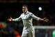LONDON, ENGLAND - FEBRUARY 14: Gareth Bale of Spurs scores his team's match winning second goal from a free kick during the UEFA Europa League round of 32 first leg match between Tottenham Hotspur and Olympique Lyonnais at White Hart Lane on February 14, 2013 in London, England. (Photo by Paul Gilham/Getty Images)