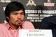 BEVERLY HILLS, CA - SEPTEMBER 17: Boxer Manny Pacquiao listens during the Manny Pacquiao v Juan Manuel Marquez - Press Conference at Beverly Hills Hotel on September 17, 2012 in Beverly Hills, California. (Photo by Victor Decolongon/Getty Images)