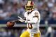 ARLINGTON, TX - NOVEMBER 22: Robert Griffin III #10 of the Washington Redskins throws the ball against the Dallas Cowboys during a Thanksgiving Day game at Cowboys Stadium on November 22, 2012 in Arlington, Texas. (Photo by Ronald Martinez/Getty Images)