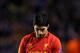 LIVERPOOL, ENGLAND - FEBRUARY 21: A dejected Luis Suarez of Liverpool reacts as his team win on the night but exit the competition during the UEFA Europa League round of 32 second leg match between Liverpool FC and FC Zenit St Petersburg at Anfield on February 21, 2013 in Liverpool, England. (Photo by Alex Livesey/Getty Images)