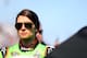 DAYTONA BEACH, FL - FEBRUARY 21: Danica Patrick, driver of the #10 GoDaddy.com Chevrolet, stands on the grid prior to the NASCAR Sprint Cup Series Budweiser Duel 1 at Daytona International Speedway on February 21, 2013 in Daytona Beach, Florida. (Photo by Mike Ehrmann/Getty Images)