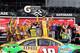 DAYTONA BEACH, FL - FEBRUARY 21: Kyle Busch, driver of the #18 M&M's Toyota, celebrates in Victory Lane after winning the NASCAR Sprint Cup Series Budweiser Duel 2 at Daytona International Speedway on February 21, 2013 in Daytona Beach, Florida. (Photo by Jerry Markland/Getty Images)