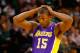 BOSTON, MA - FEBRUARY 7: Metta World Peace #15 of the Los Angeles Lakers folds his hands over his head following a change in possession against the Boston Celtics during the game on February 7, 2013 at TD Garden in Boston, Massachusetts. NOTE TO USER: User expressly acknowledges and agrees that, by downloading and or using this photograph, User is consenting to the terms and conditions of the Getty Images License Agreement. (Photo by Jared Wickerham/Getty Images)