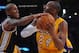 Dec. 27, 2011; Los Angeles, CA, USA; Utah Jazz shooting guard Raja Bell (19) defends Los Angeles Lakers shooting guard Kobe Bryant (24) as he looks for a shot during the first half of the game at the Staples Center. Mandatory Credit: Jayne Kamin-Oncea-USA TODAY Sports
