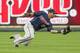KANSAS CITY, MO - SEPTEMBER 01: Center fielder Darin Mastroianii #19 of the Minnesota Twins makes a sliding catch in a game against the Kansas City Royals at Kauffman Stadium on September 1, 2012 in Kansas City, Missouri. (Photo by Tim Umphrey/Getty Images)