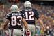 FOXBORO, MA - OCTOBER 7: Wes Welker #83 of the New England Patriots reacts in the end zone with teammate Tom Brady #12 after a touchdown against the Denver Broncos in the first half at Gillette Stadium on October 7, 2012 in Foxboro, Massachusetts. (Photo by Jim Rogash/Getty Images)