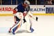 UNIONDALE, NY - FEBRUARY 11: Rick DiPietro #39 of the New York Islanders in action against the Carolina Hurricanes during their game at Nassau Veterans Memorial Coliseum on February 11, 2013 in Uniondale, New York. (Photo by Al Bello/Getty Images)