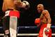 LAS VEGAS, NV - MAY 05: Floyd Mayweather Jr. looks over at Miguel Cotto during their WBA super welterweight title fight at the MGM Grand Garden Arena on May 5, 2012 in Las Vegas, Nevada. (Photo by Al Bello/Getty Images)
