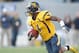 December 1, 2012; Morgantown, WV, USA; West Virginia Mountaineers running back Tavon Austin (1) rushes the ball against the Kansas Jayhawks during the first quarter at Milan Puskar Stadium. The West Virginia Mountaineers won 59-10. Mandatory Credit: Charles LeClaire-USA TODAY Sports