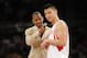 Feb 16, 2013; Houston, TX, USA; Houston Rockets guard Jeremy Lin (7) is interviewed by television/radio personality Nick Cannon during the 2013 NBA all star skills challenge at the Toyota Center. Mandatory Credit: Brett Davis-USA TODAY Sports