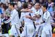 MADRID, SPAIN - OCTOBER 20: Gonzalo Higuain of Real Madrid CF celebrates scoring their first goal with teammates Cristiano Ronaldo (L), Sergio Ramos (2ndL), Pepe (2ndR) and Mezut Ozil (R) during the La Liga match between Real Madrid CF and RC Deportivo La Coruna at Bernabeu on October 20, 2012 in Madrid, Spain. (Photo by Gonzalo Arroyo Moreno/Getty Images)