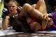March 3, 2012; Columbus, OH, USA; Ronda Rousey punches Miesha Tate during the Strikeforce Grand Prix final at Nationwide Arena. Mandatory Credit: Greg Bartram-USA TODAY Sports