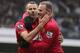 LONDON, ENGLAND - FEBRUARY 23: Ryan Giggs of Manchester United celebrates a goal with Wayne Rooney during the Barclays Premier League match between Queens Park Rangers and Manchester United at Loftus Road on February 23, 2013 in London, England. (Photo by Ian Walton/Getty Images)