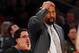NEW YORK, NY - FEBRUARY 13: Head coach Mike Woodson of the New York Knicks reacts after Tyson Chandler is called for his fourth foul against the Toronto Raptors on February 13, 2013 at Madison Square Garden in New York City. The Toronto Raptors defeated the New York Knicks 92-88. NOTE TO USER: User expressly acknowledges and agrees that, by downloading and/or using this photograph, user is consenting to the terms and conditions of the Getty Images License Agreement. (Photo by Elsa/Getty Images)