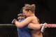 ANAHEIM, CA - FEBRUARY 23: Ronda Rousey celebrates her UFC Bantamweight Title over Liz Carmouche with a member of her team at Honda Center on February 23, 2013 in Anaheim, California. (Photo by Jeff Gross/Getty Images)