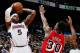 ATLANTA, GA - FEBRUARY 20: Josh Smith #5 of the Atlanta Hawks shoots over Norris Cole #30 of the Miami Heat at Philips Arena on February 20, 2013 in Atlanta, Georgia. NOTE TO USER: User expressly acknowledges and agrees that, by downloading and or using this photograph, User is consenting to the terms and conditions of the Getty Images License Agreement. (Photo by Kevin C. Cox/Getty Images)