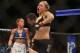 ANAHEIM, CA - FEBRUARY 23: Ronda Rousey celebrates her UFC Bantamweight Title over Liz Carmouche at Honda Center on February 23, 2013 in Anaheim, California. (Photo by Jeff Gross/Getty Images)