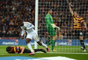 Nathan Dyer wheels away after opening the scoring for Swansea.