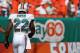 MIAMI GARDENS, FL - NOVEMBER 25: Reggie Bush #22 of the Miami Dolphins stretches before a game against the Seattle Seahawks at Sun Life Stadium on November 25, 2012 in Miami Gardens, Florida. (Photo by Mike Ehrmann/Getty Images)