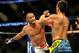 Feb 23, 2013; Anaheim, CA, USA; Dan Henderson (blue gloves) fights Lyoto Machida (red gloves) during their UFC welterweight bout at the Honda Center. Mandatory Credit: Jayne Kamin-Oncea-USA TODAY Sports