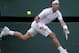 June 28, 2012; London, ENGLAND; Rafael Nadal (ESP) returns a shot against Lukas Rosol (CZE) on day four of the 2012 Wimbledon Championships at the All England Lawn Tennis Club. Mandatory Credit: Susan Mullane-USA TODAY Sports