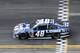 DAYTONA BEACH, FL - FEBRUARY 24: Jimmie Johnson, driver of the #48 Lowe's Chevrolet, crosses the finish line to win the NASCAR Sprint Cup Series Daytona 500 at Daytona International Speedway on February 24, 2013 in Daytona Beach, Florida. (Photo by Matthew Stockman/Getty Images)
