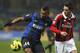 MILAN, ITALY - FEBRUARY 24: Vasquez Fredy Alejandro Guarin of FC Internazionale Milano competes for the ball with Mattia De Sciglio of AC Milan during the Serie A match FC Internazionale Milano and AC Milan at San Siro Stadium on February 24, 2013 in Milan, Italy. (Photo by Marco Luzzani/Getty Images)