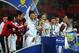 LONDON, ENGLAND - FEBRUARY 24: Swansea City players celebrate with the trophy during the Capital One Cup Final match between Bradford City and Swansea City at Wembley Stadium on February 24, 2013 in London, England. (Photo by Michael Regan/Getty Images)
