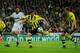 MADRID, SPAIN - NOVEMBER 06: Robert Lewandowski (C) of Borussia Dortmund fires on goal in between Xabi Alonso (L) of Real Madrid and his teammate Kevin Grosskreutz during the UEFA Champions League group D match between Real Madrid and Borussia Dortmund at Estadio Santiago Bernabeu on November 6, 2012 in Madrid, Spain. (Photo by Jasper Juinen/Getty Images)