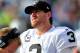 CHARLOTTE, NC - DECEMBER 23: Carson Palmer #3 of the Oakland Raiders watches from the sidelines during the second half after being injured during a game against the Carolina Panthers at Bank of America Stadium on December 23, 2012 in Charlotte, North Carolina. Carolina defeated Oakland 17-6. (Photo by Grant Halverson/Getty Images)