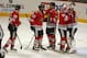 CHICAGO, IL - FEBRUARY 24: (L-R) Marcus Kruger #16, Johnny Oduya #27, Niklas Hjalmarsson #4 and Jonathan Toews #19 of the Chicago Blackhawks line-up to congratulate Corey Crawford #50 after a win over the Columbus Blue Jackets at the United Center on February 24, 2013 in Chicago, Illinois. The Blackhawks defeated the Blue Jackets 1-0. (Photo by Jonathan Daniel/Getty Images)