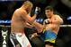 Feb 23, 2013; Anaheim, CA, USA; Dan Henderson (blue gloves) fights Lyoto Machida (red gloves) during their UFC welterweight bout at the Honda Center. Mandatory Credit: Jayne Kamin-Oncea-USA TODAY Sports