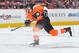 PHILADELPHIA, PA - FEBRUARY 09: Matt Read #24 of the Philadelphia Flyers shoots during the game against the Carolina Hurricanes at the Wells Fargo Center on February 9, 2013 in Philadelphia, Pennsylvania. (Photo by Drew Hallowell/Getty Images)