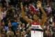 February 23, 2013; Washington, DC, USA; Washington Wizards small forward Trevor Ariza (1) celebrates after the Wizards' game against the Houston Rockets at Verizon Center. The Wizards won 105-103. Mandatory Credit: Geoff Burke-USA TODAY Sports