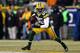 GREEN BAY, WI - JANUARY 05: Wide receiver Greg Jennings #85 of the Green Bay Packers runs after a catch against the Minnesota Vikings during the NFC Wild Card Playoff game at Lambeau Field on January 5, 2013 in Green Bay, Wisconsin. (Photo by Jonathan Daniel/Getty Images)