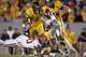 MORGANTOWN, WV - NOVEMBER 17: Tavon Austin #1 of the West Virginia Mountaineers carries the ball against Julian Wilson #2 of the Oklahoma Sooners during the game on November 17, 2012 at Mountaineer Field in Morgantown, West Virginia. (Photo by Justin K. Aller/Getty Images)