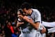 BARCELONA, SPAIN - FEBRUARY 26: Cristiano Ronaldo (L) of Real Madrid CF celebrates with his team-mates Alvaro Arbeloa (C) and Sergio Ramos after scoring his team's their goal during the Copa del Rey Semi Final second leg between FC Barcelona and Real Madrid at Camp Nou on February 26, 2013 in Barcelona, Spain. (Photo by David Ramos/Getty Images)