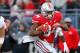 COLUMBUS, OH - NOVEMBER 03: Carlos Hyde #34 of the Ohio State Buckeyes runs past Mason Monheim #43 of the Illinois Illini on November 3, 2012 at Ohio Stadium in Columbus, Ohio. Ohio State defeated Illinois 52-22. (Photo by Kirk Irwin/Getty Images)